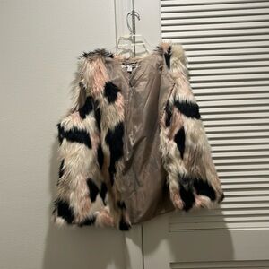 Black, white, and pink ( say what? ) Vest. Perfect for any occasion and comfy!